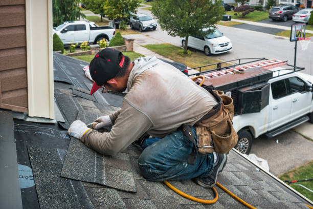 Professional Flat Roof Repair technician working in Alpine, NY